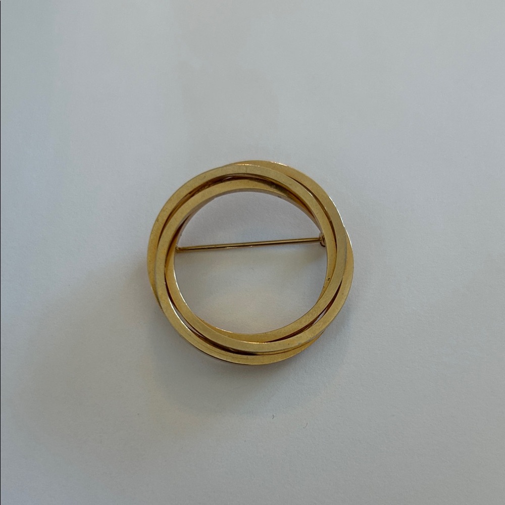 Vintage Burt Cassell signed circle brooch
